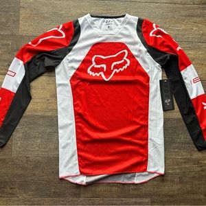 New with tags men’s Fox Racing Jersey. Size S